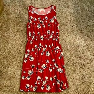 This soft dress with a cinched waist is a great buy for casual wear.